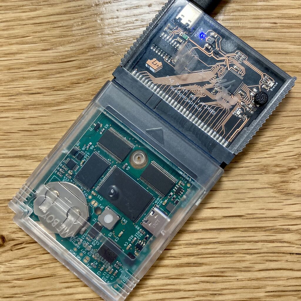 GBxCartRW in 3D printed/acrylic shell, with bootleg cartridge inserted